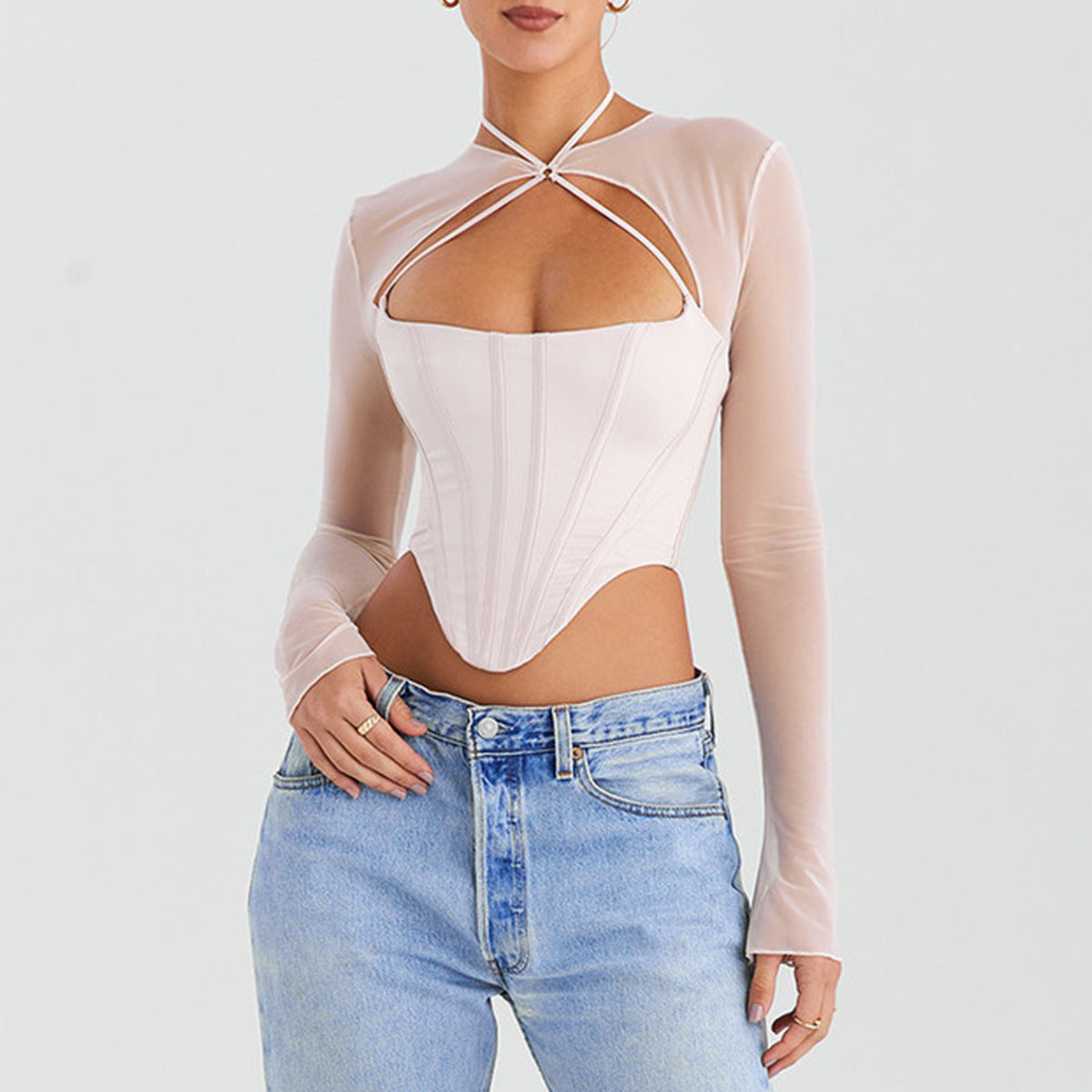 Dopamine wears a new mesh splicing hollowed-out waist long sleeve fishbone halter top