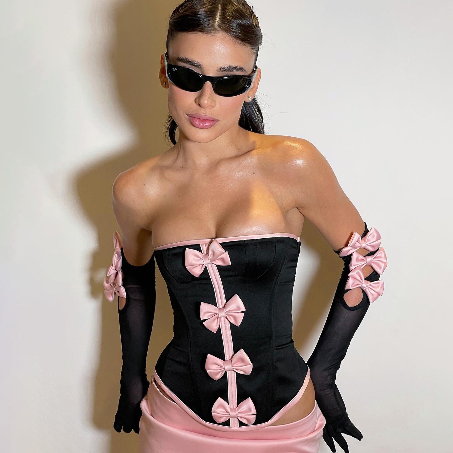 European and American women's two-piece binding backless skirt irregular dress bow suit sexy hollowed out short skirt